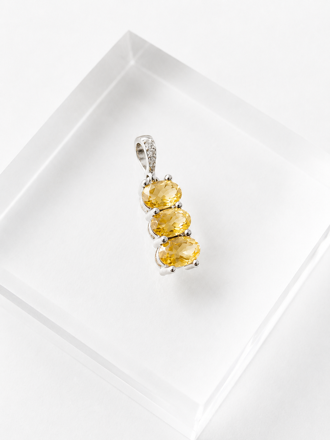 Charm Solsticio Topacio Oro Blanco